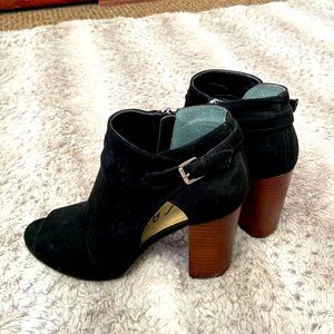 Black suede, open toe booties. Brown 4” heel. Zip up. Silver buckle.